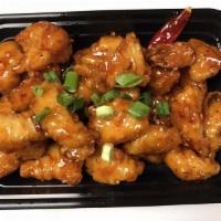 General Tso's Chicken 左鸡 · Crispy chicken with light toss of hot sauce similar sauce to sesame chicken. White meat chic...