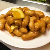 Orange Chicken 橙汁鸡 · Lightly battered chicken breast fillet served with our home made fresh orange sauce. White m...