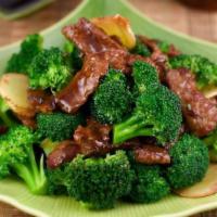 Broccoli Beef 西兰牛 · Flank steak sauteed with fresh broccoli and a touch of garlic and onion in house brown sauce.