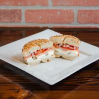 #10. Lox Sandwich · Lox, cream cheese, red onion, capers and tomatoes on a bagel.