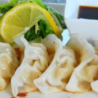 Dumplings · 6 pieces. Your choice of steamed or fried.