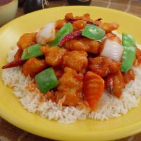 Empress Chicken · Crispy white meat tossed with a mixed of carrots, onion, green pepper, peapod, and pineapple...