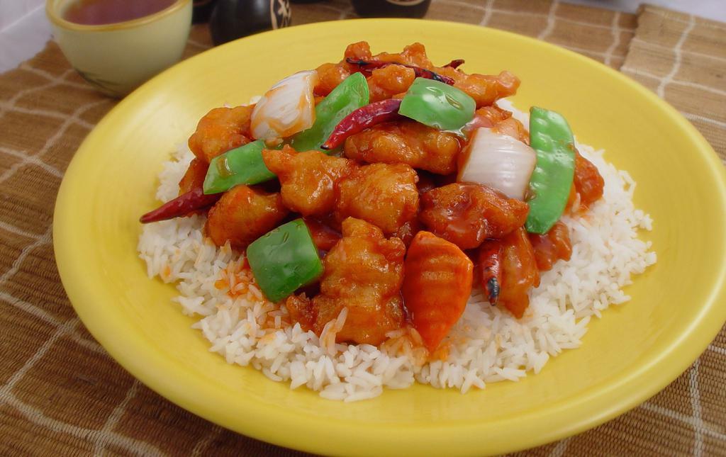 Empress Chicken · Crispy white meat tossed with a mixed of carrots, onion, green pepper, peapod, and pineapple in our spicy sweet and sour sauce. Spicy.
