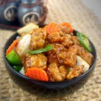 Gang Pang Chicken · Crispy Chicken chunk tossed in a sweet and spicy stir-fry soy sauce based with carrots, onio...