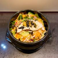 Korean Rice Bowl (Deopbap - 덮밥) · Korean-Style Rice bowl topped with a mixed vegetable blend (Iceberg Lettuce, Arugula/Kale, R...