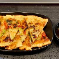 Scallion Pancake (Pajeon - 파전) · Korean-Style pancake with scallion, red bell pepper, and white onion. Slightly charred on th...
