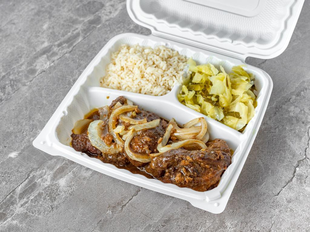 Smothered Pork Chops  · Covered in gravy, onions, and peppers. Served with your choice of 2 sides.