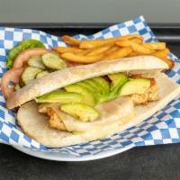 Avocado and Swiss Sandwich · Avocado, Swiss cheese, onion, lettuce, tomato, pickles, and ranch dressing.