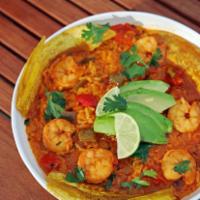 Asopao · A Caribbean stew made with shrimp, rice, bell peppers, culantro, achiote, and garlic. Topped...