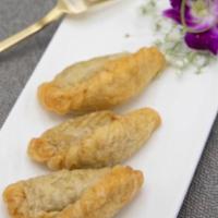13. Curry Puff · 3 pieces. Stuffed with chicken, potato, onion and curry powder with cucumber sauce.
