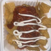 Wet Burrito · Burrito with your choice meat, beans, rice, onions and cilantro topped with cheese and side ...
