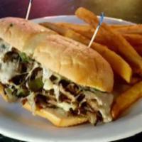 PHILLY CHEESESTEAK  · Thinly sliced sirloin beef or chicken, green peppers, grilled onions, and Swiss cheese on a ...