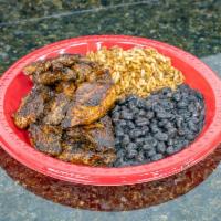 Jerk Chicken Plate · A mixture of herbs, spices, and seasonings. Served with black beans and rice.