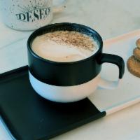 Canelita Latte · Cinnamon latte with Mexican vanilla, agave syrup topped with cookie crumbles, cinnamon and s...