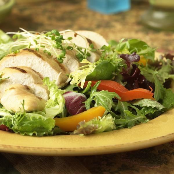 Chicken Salad · Crispy Romaine lettuce topped with grilled chicken breast, tomatoes and onions.
