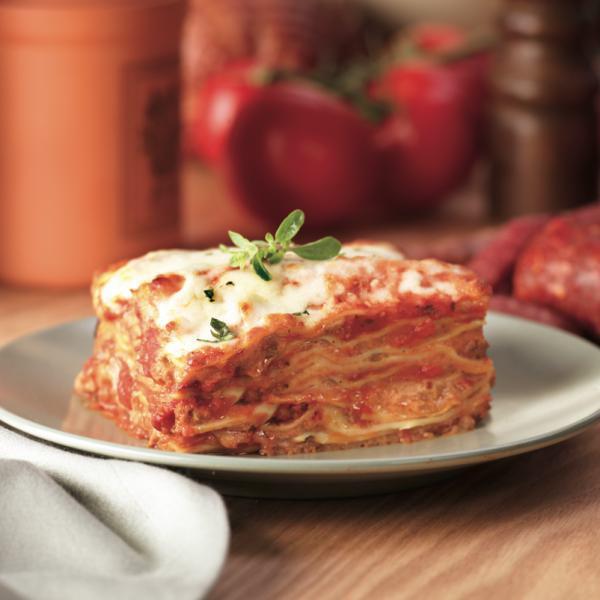 Lasagna · Pasta layered with ground beef, ricotta cheese and Italian herbs topped with homemade marinara sauce.