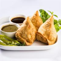 SAMOSA · A samosa is a popular Indian appetizer, fried pastry with a savory filling with spiced potat...