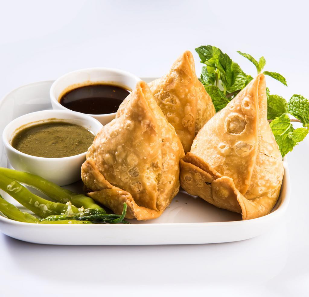 SAMOSA · A samosa is a popular Indian appetizer, fried pastry with a savory filling with spiced potatoes, onions etc. 