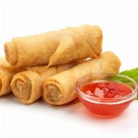 Veg Spring Roll · 4 Pieces - Spring rolls are filled with minced vegetables folded into a food wrapper made fr...