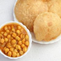 Poor with Channa · Channa masala or Chole is a delicious Indian dish made by chickpeas in a spicy onion & tomat...