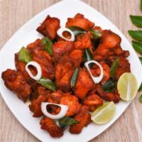 Chicken 65 · Chicken 65 is a favorite Indian starter made by tender boneless chicken cubes marinade with ...