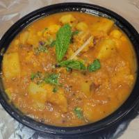 Aloo Gobi Masala  · Comes with Rice and Roti 