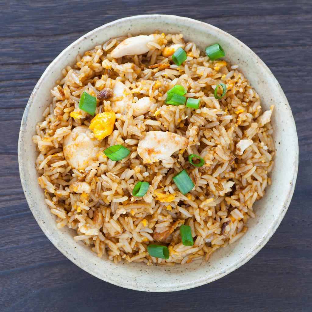 Chicken Fried rice  · It's a popular and flavored rice recipe made with cooked rice, fried chicken, finely chopped vegetables, and seasoning ingredients