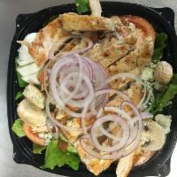 Cobb with Chicken Breast Salad · Mixed romaine and iceberg lettuce topped with grilled chicken breast, chopped bacon, tomatoe...