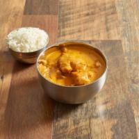 Chicken Korma · Boneless chicken cooked with mild cream, almonds and coconuts.