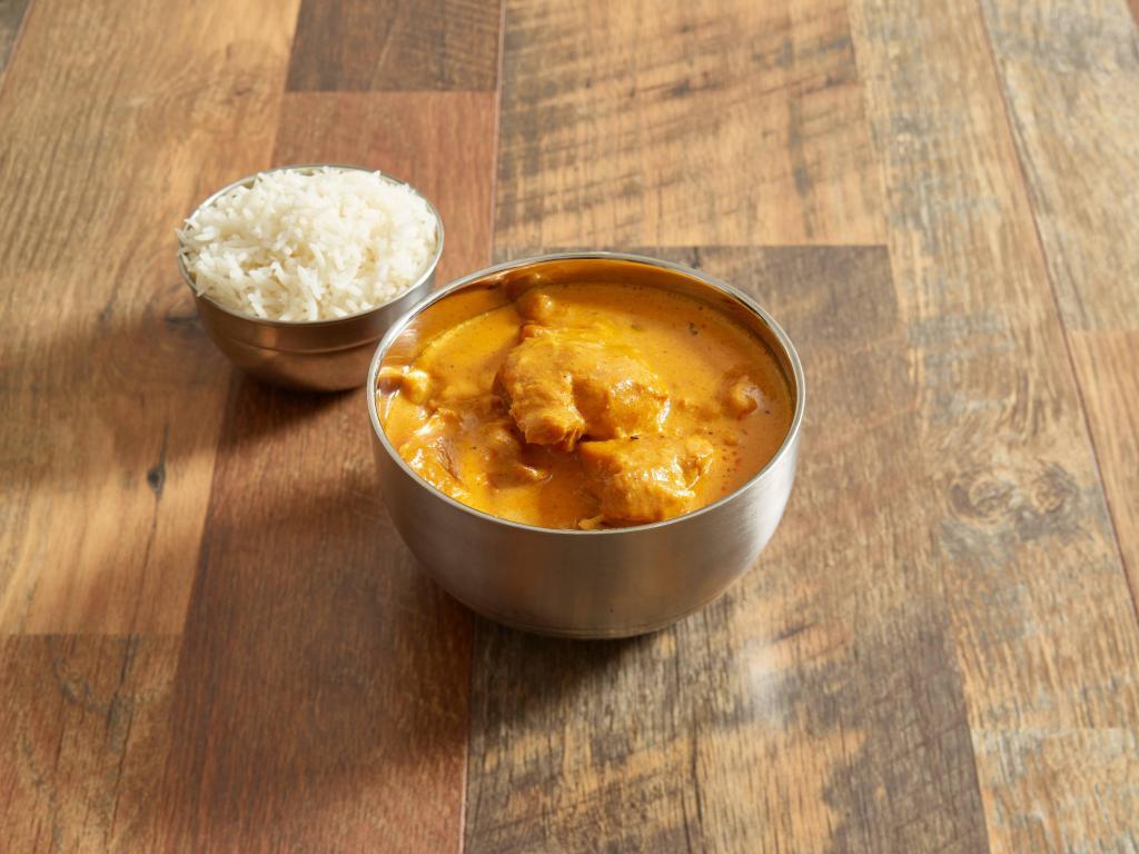Chicken Korma · Boneless chicken cooked with mild cream, almonds and coconuts.