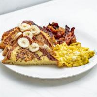 3. French Toast · Syrup, banana, 2 eggs, side of sausage or bacon,