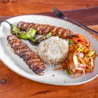Lamb Adana Kebab · Ground lamb flavored with red bell peppers slightly seasoned with paprika and grilled delici...