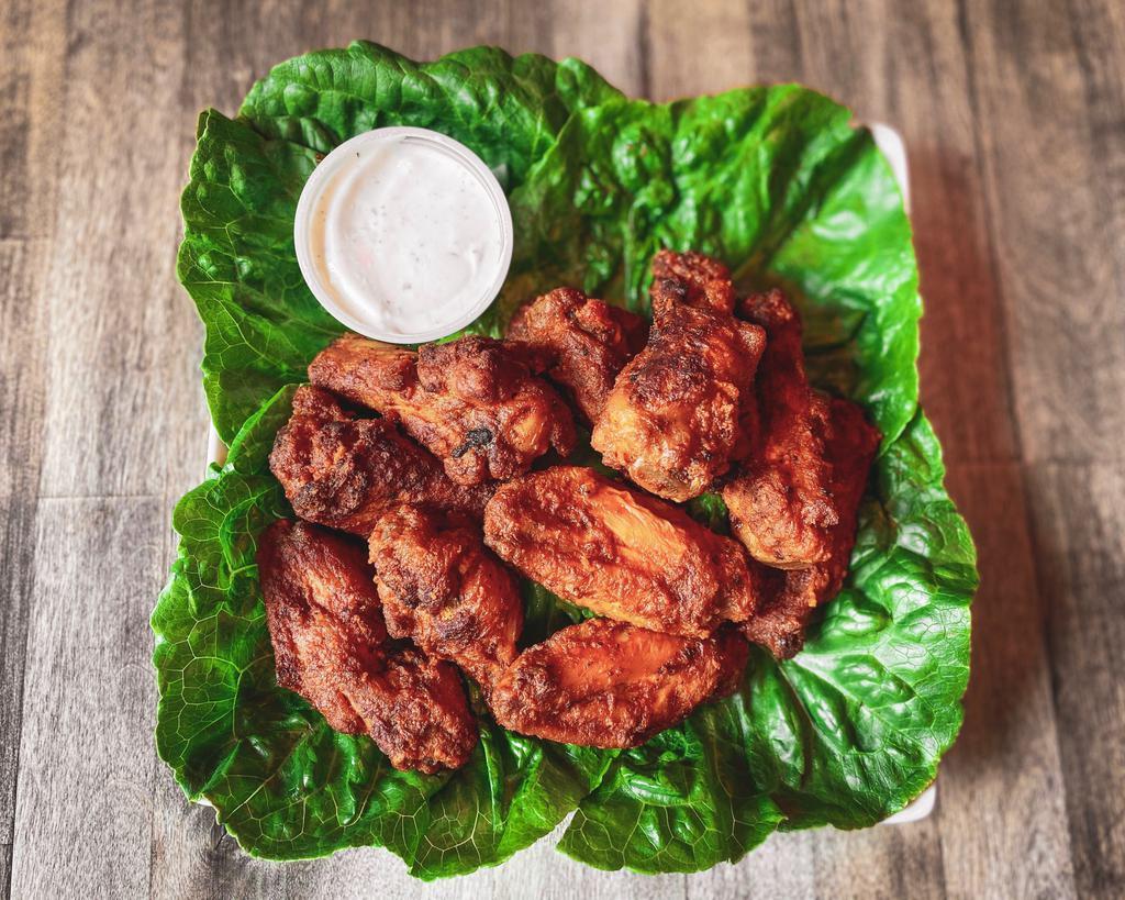Bone In 2LBS · Two pounds (15-16 pieces ) of bone-in chicken wings. Ranch not included