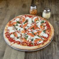 Margherita Pizza · Red sauce, fresh mozzarella, fresh basil, and Roma tomatoes.