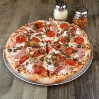 The Meats Pizza · Red sauce, mozzarella, pepperoni, ham, beef, sausage, and bacon.