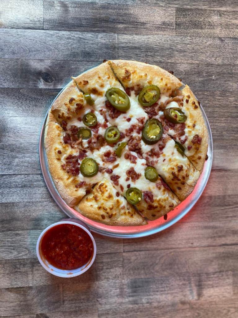 Big Boy Cheesy Bread · Our cheesy bread with an upgrade, jalapenos and bacon added