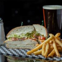 Classic Grilled Chicken Sandwich · Juicy chicken breasts served on a French roll with lettuce, tomato, and mayo.