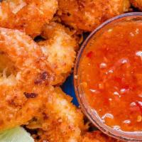Fried Coconut Shrimp (8) · Jumbo shrimp coated with coconut flakes, lightly battered and served with remoulade sauce