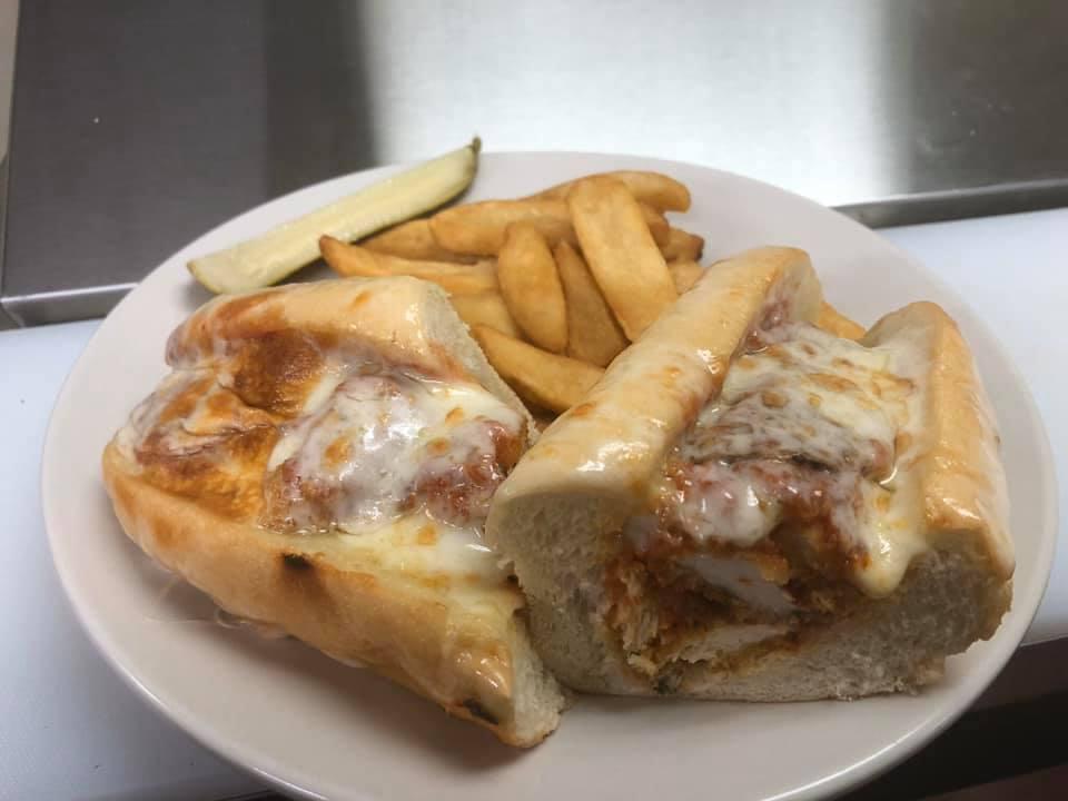 Chicken Parmesan Sub · Crispy chicken cutlet covered in homemade marinara sauce and baked with provolone cheese on top. Served on fresh bread.