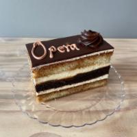 Opera  · Layers of sponge cake soaked in coffee syrup, layered with ganache and coffee French cream, ...