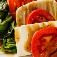 Caprese Salad · Tomatoes, fresh mozzarella, and fresh basil with a balsamic drizzle.
