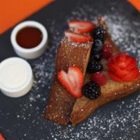 French Toast · Traditional French toast made with brioche and a side of maple syrup.