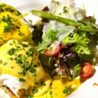 Eggs Benedict Breakfast · On homemade brioche and hollandaise sauce.