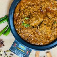 'Rarha' Goat Curry · baby goat in a brown 'bolognese style' gravy with goat 'keema'