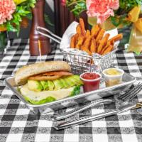 4. Burger with Muenster Cheese · Avocado. Served with lettuce, tomatoes, fresh fries and soda.