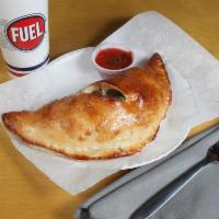 Bacon, Spinach and Tomato Calzone · Fresh dough folded over fresh toppings. Served with marinara.