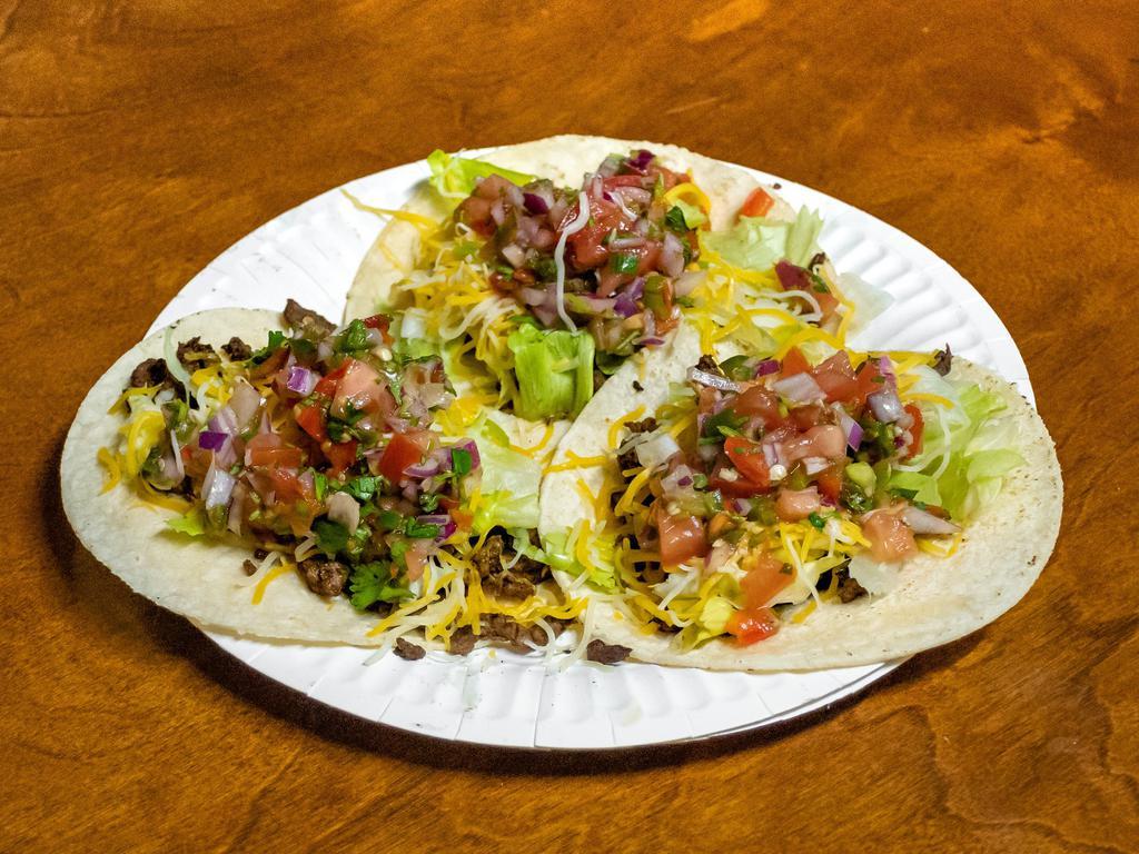 Carne Asada Taco · 3 carne asada tacos, shredded cabbage, house-made pico, sour cream and guacamole.