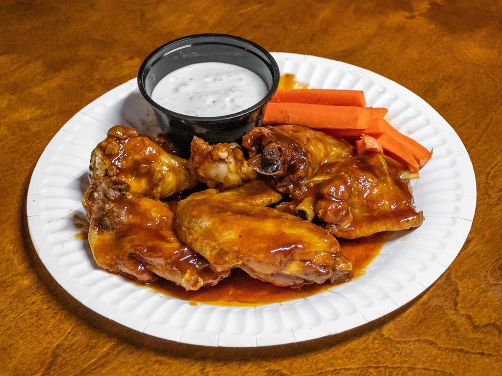 Honey BBQ Wings · 12 crispy deep fried chicken wings tossed in our house-made honey BBQ sauce served with celery sticks and ranch.