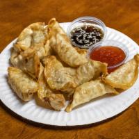 Pot Stickers · 15 chicken and vegetable deep fried pot stickers served with honey sesame teriyaki sauce and...