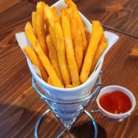 Crispy Battered Seasoned Fries · Ultimate Crispy Battered Seasoned Fries. Served with a side of ketchup.